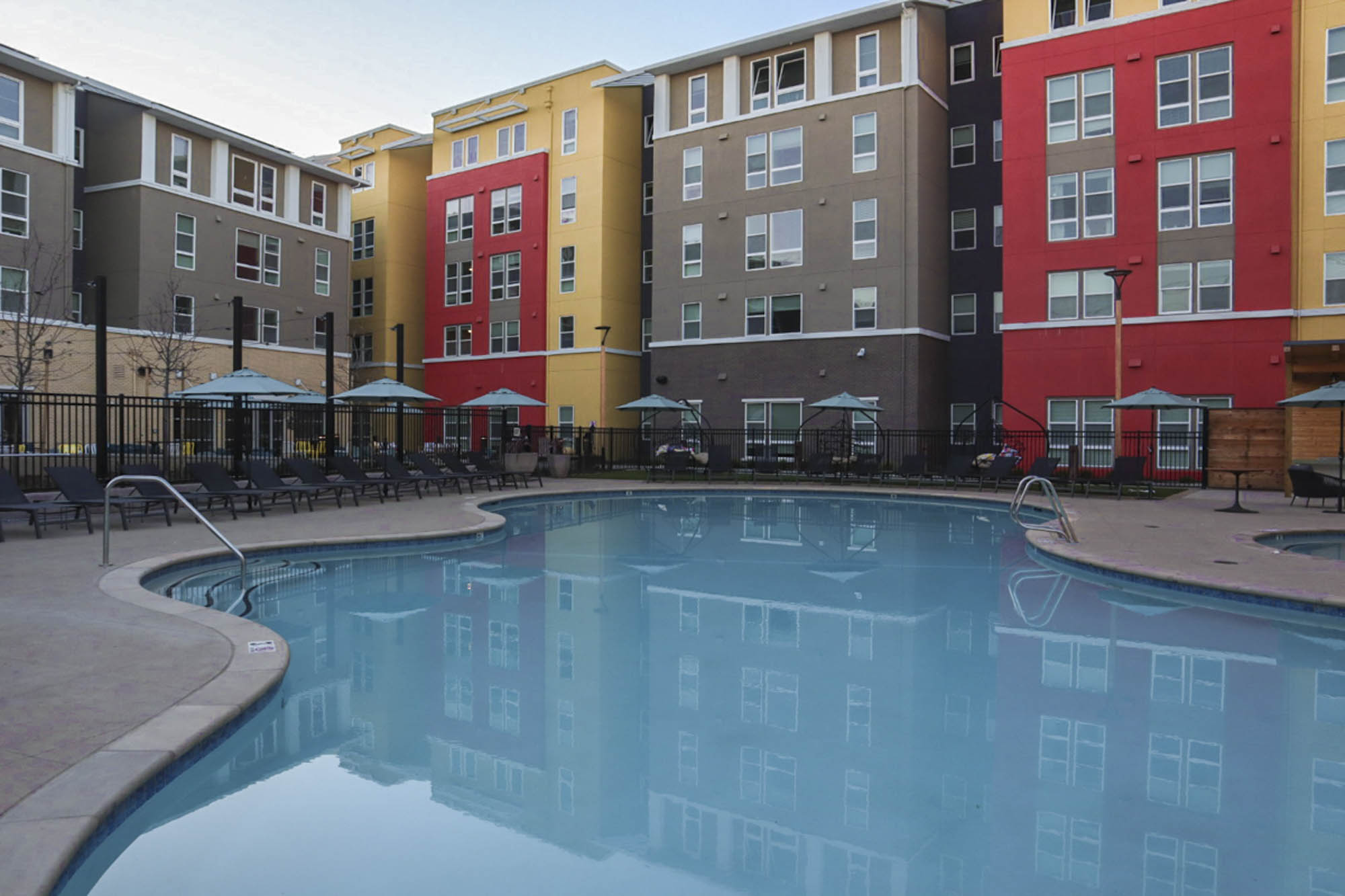 Outdoor Pool with Lounge Chairs and Tables